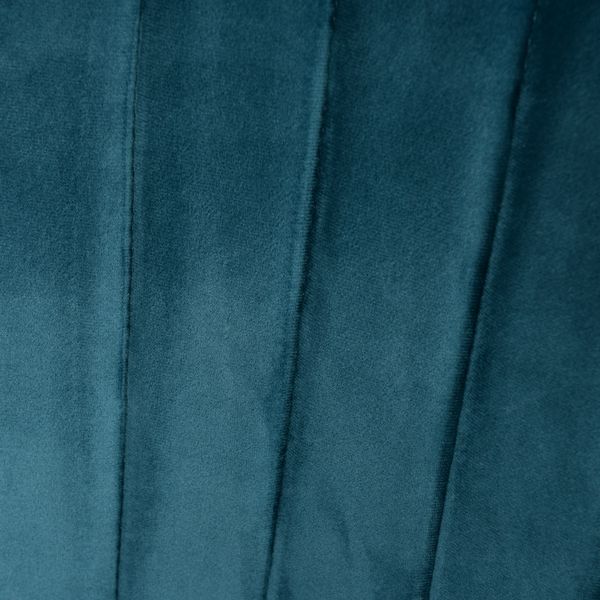 Fauteuil en velours bleu