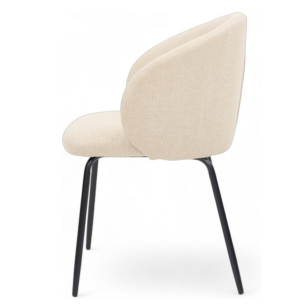 Chaise de repas ZAGO STORE en tissu écru avec dossier enveloppant et pieds en métal noir, vue de profil.